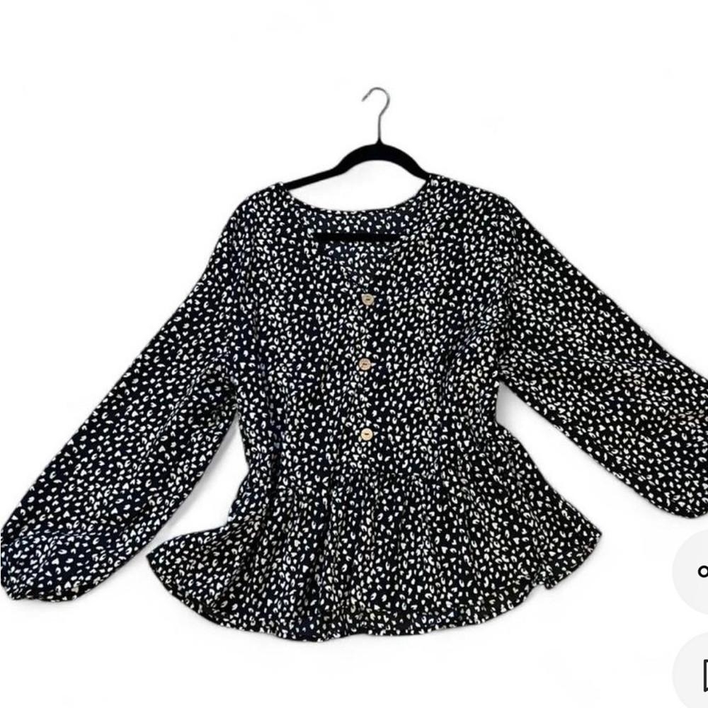 Women’s Black and White Printed Peplum Blouse